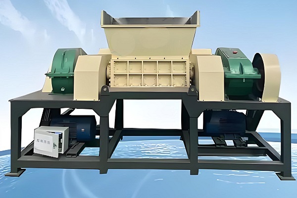 What is a double-shaft waste shredder and its application